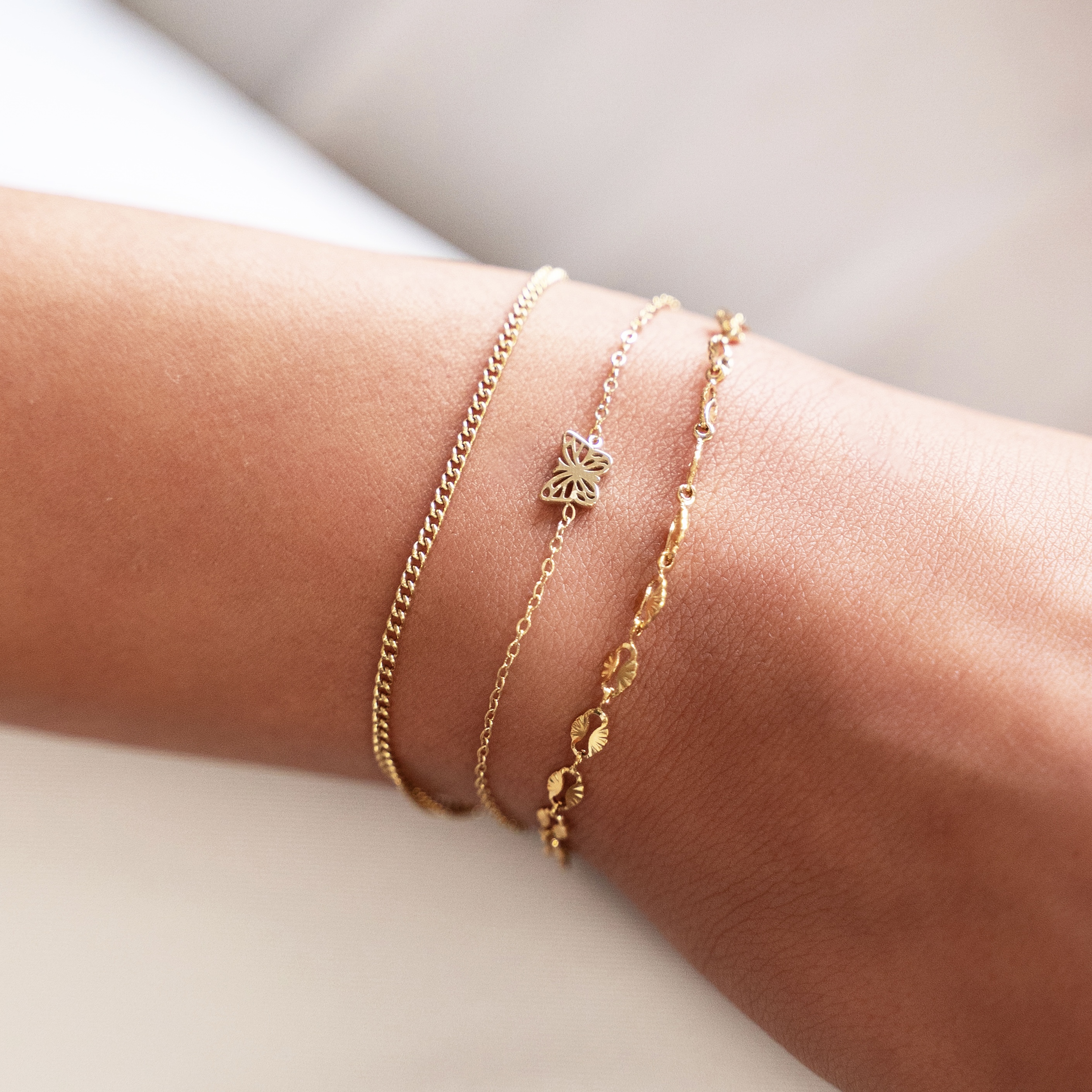 Armband bedel open vlinder